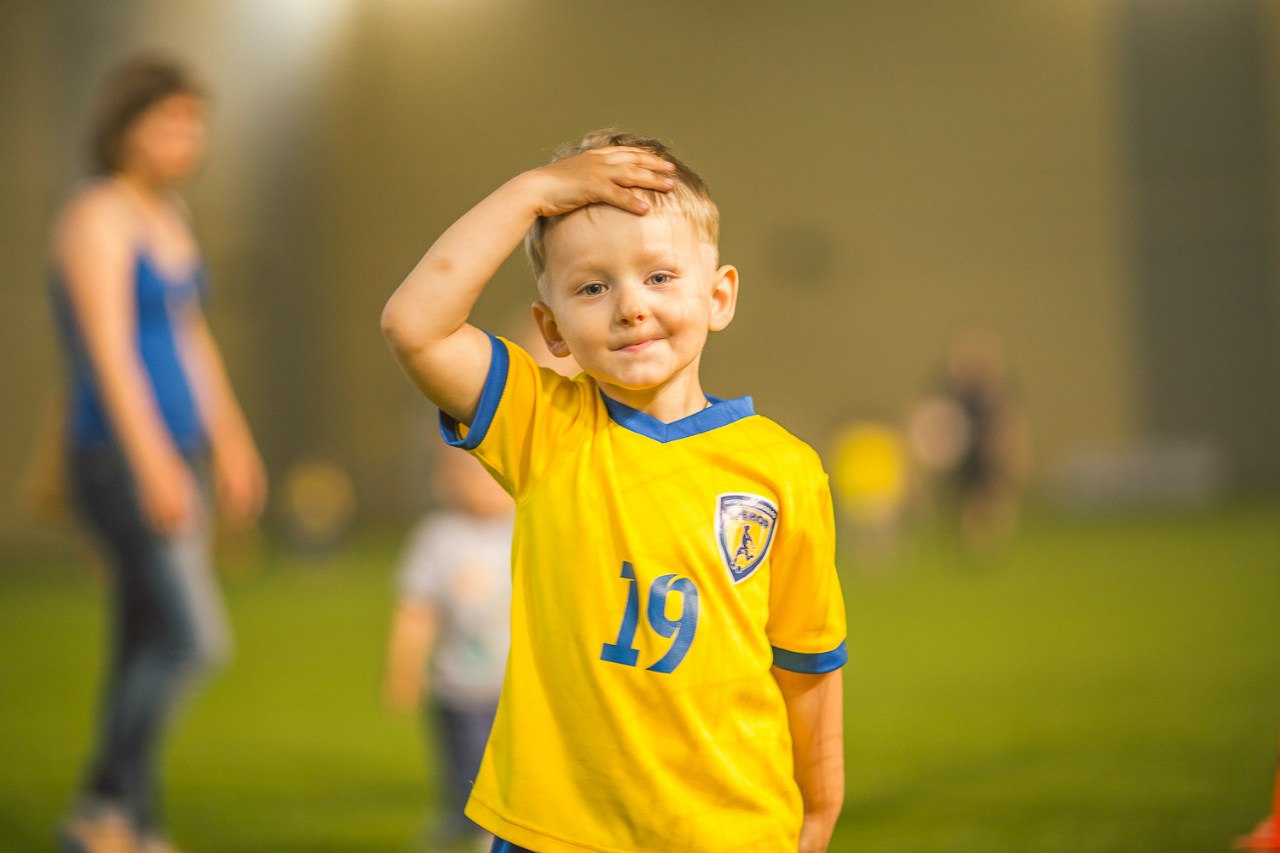 He is playing Football